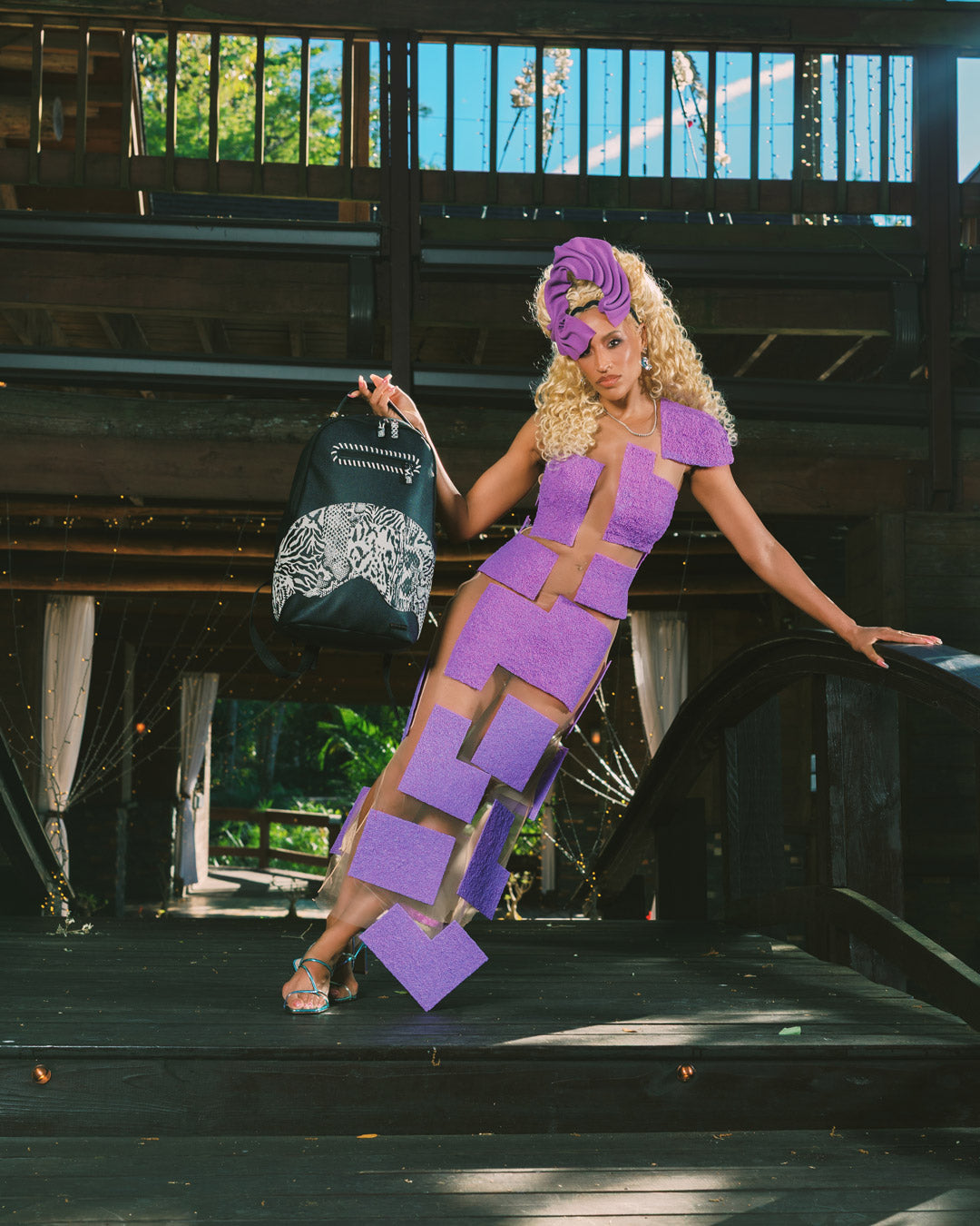 Styled view of the designer backpack with pink accents and ergonomic straps for everyday use
