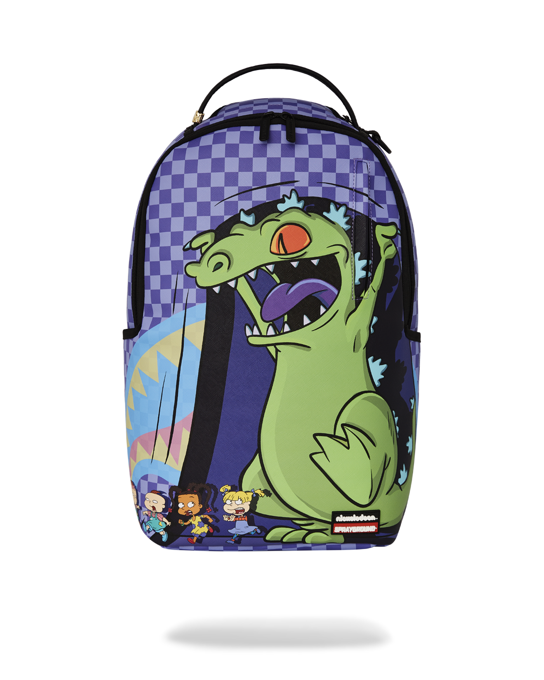 Front view of Sprayground Rugrats backpack showing Reptar and gold zipper details.