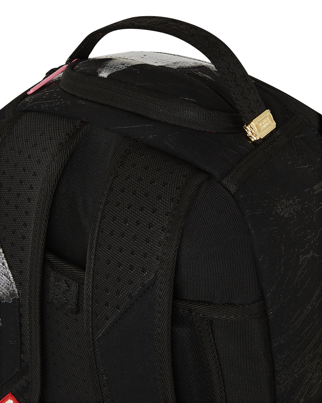 Front view of the Shark Central waxed cotton canvas backpack showing side pockets and front zipper.