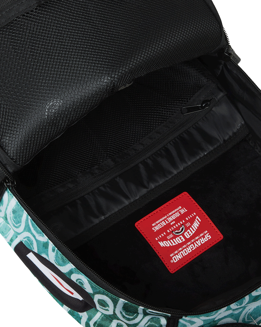 Side profile showing ergonomic padding and hidden stash pockets on luxury backpack