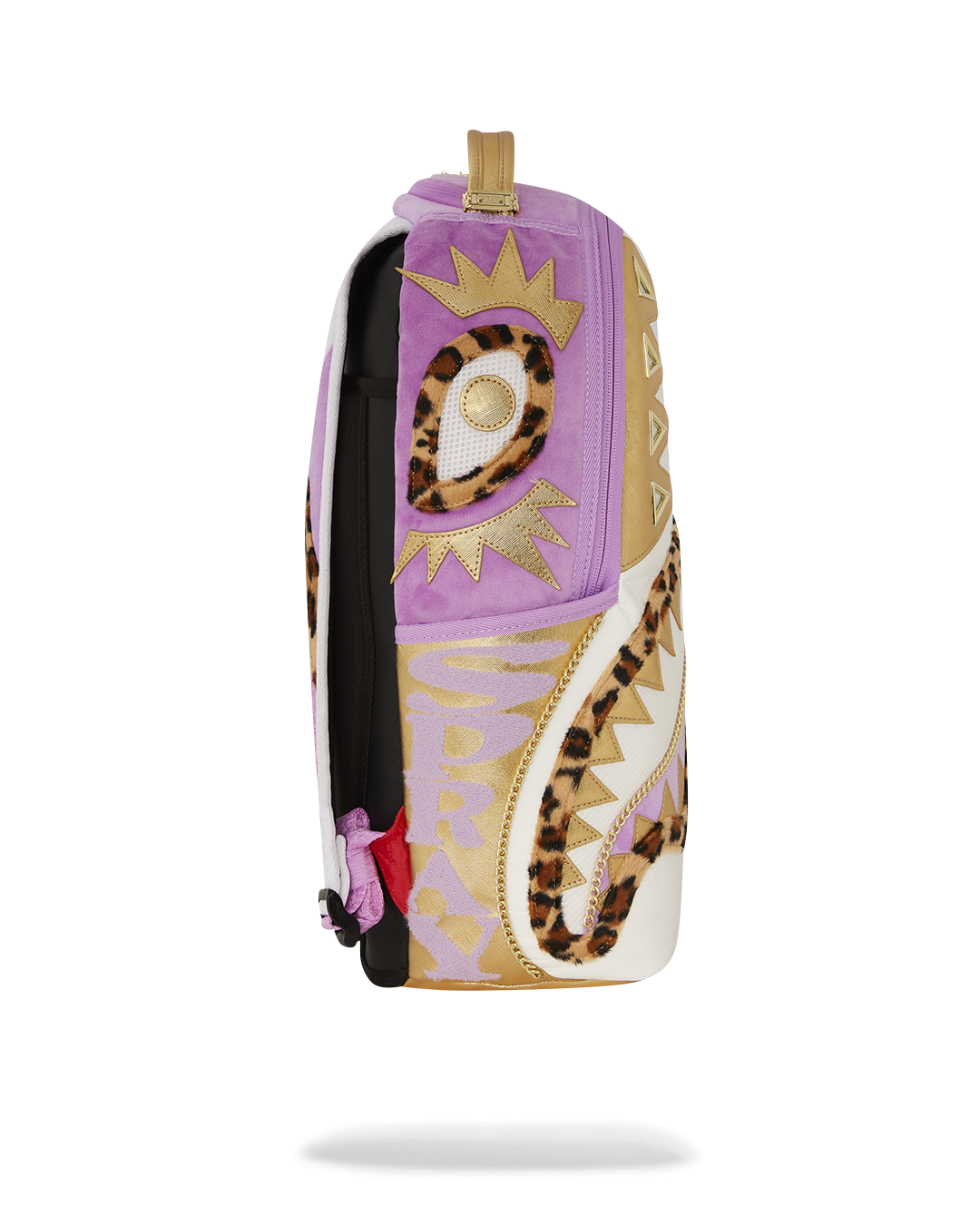 Close-up of Sprayground’s pyramid design and gold zippers