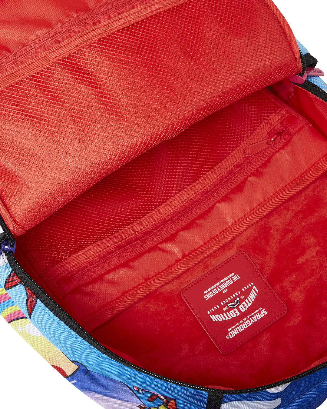 Interior view of the Bloom Bear Backpack showing the separate laptop compartment.