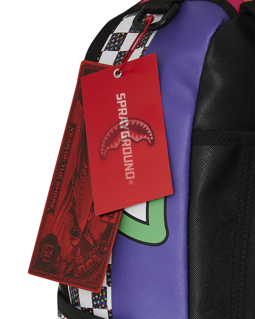 Open DLXV backpack showcasing laptop sleeve and mesh organization pockets
