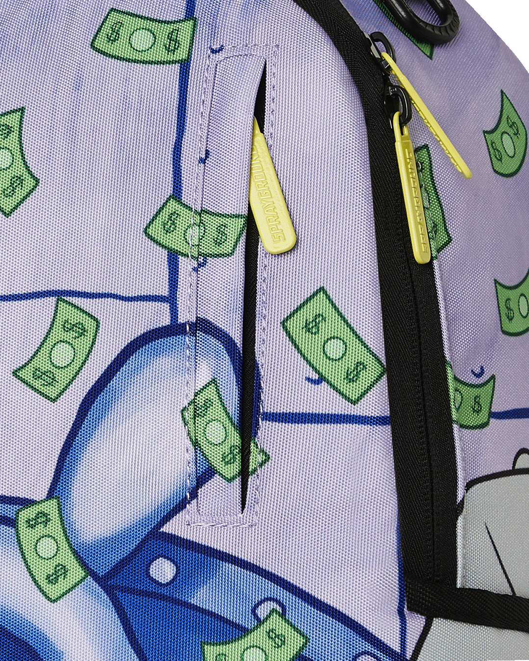 Interior of the SpongeBob backpack displaying the velour laptop compartment and mesh organizer.