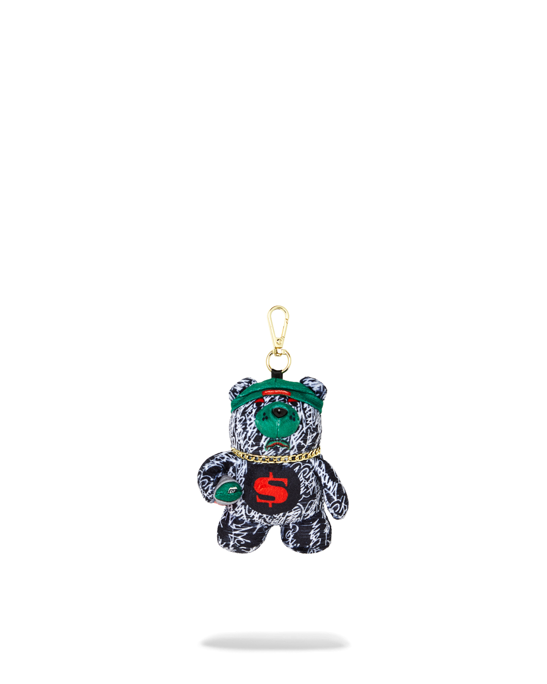 Night Night Bear Keychain dangling from a backpack zipper
