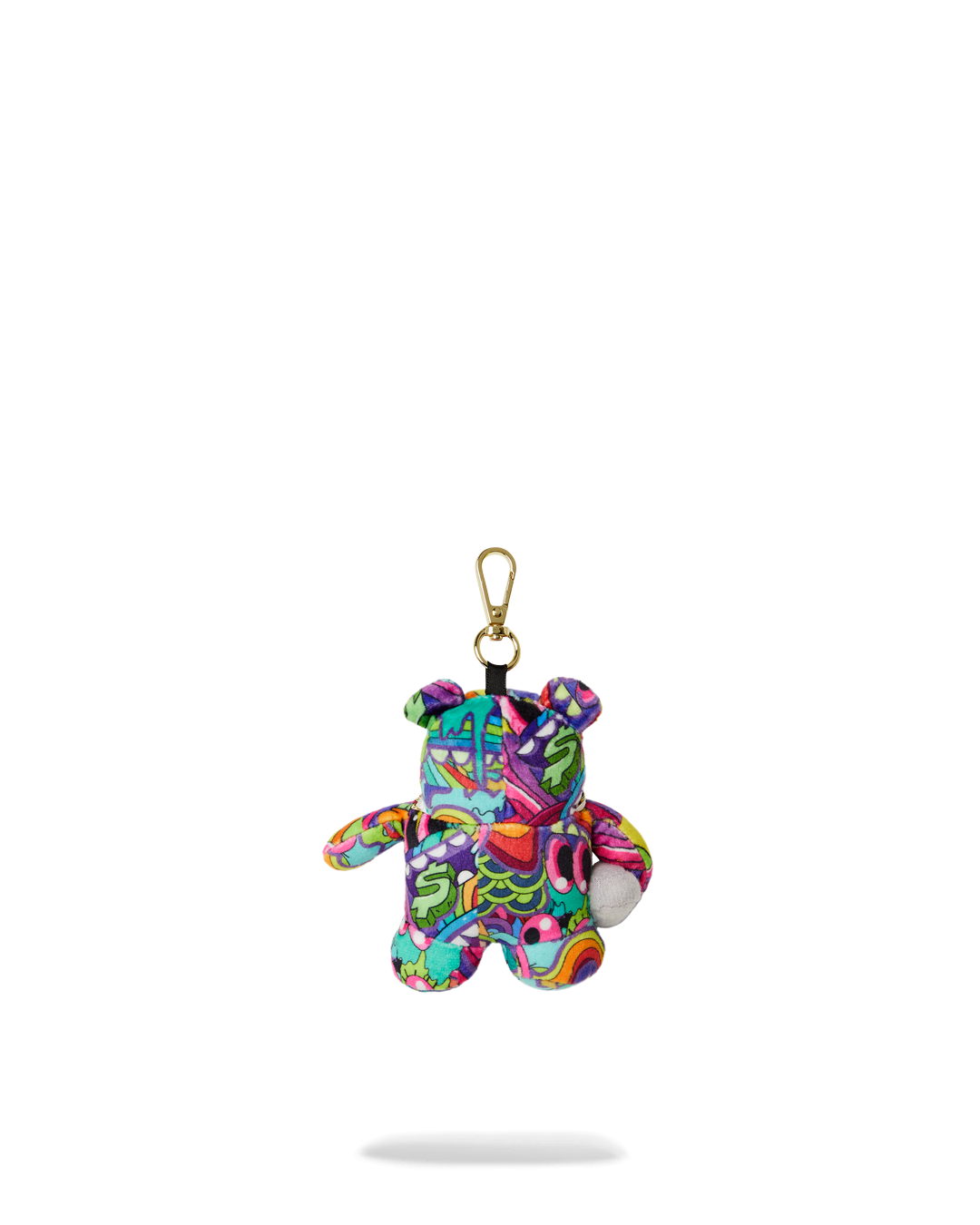 Charming bear keychain plush toy attached to a stylish handbag.