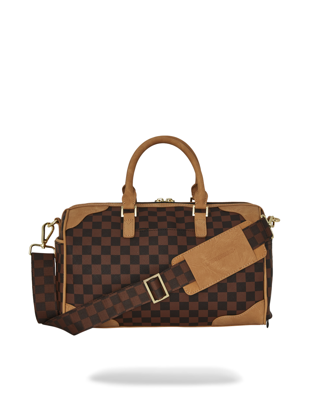 Front view of faux leather crossbody bag on model walking in downtown Chicago