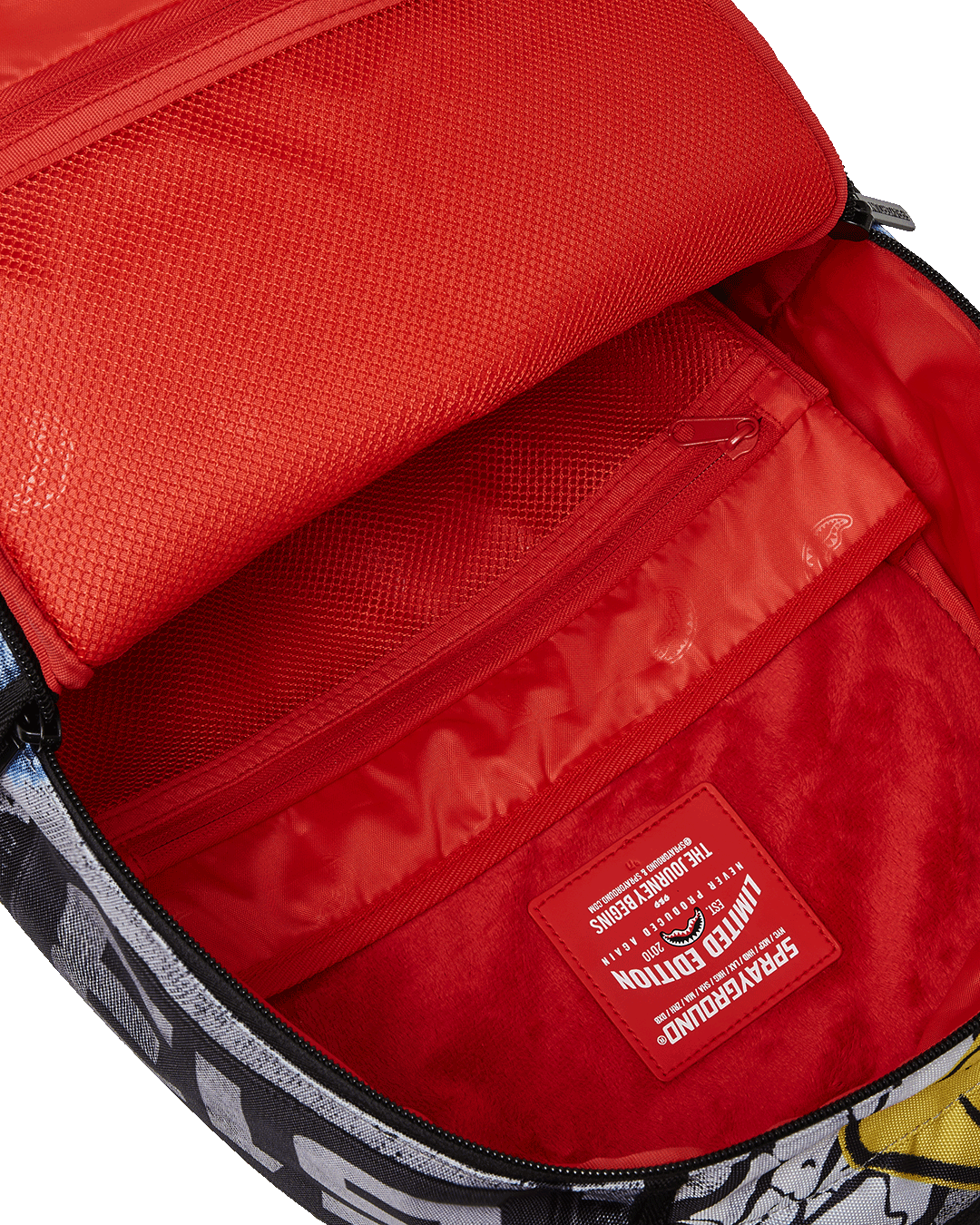 Side profile of the luxury backpack showing ergonomic mesh padding.