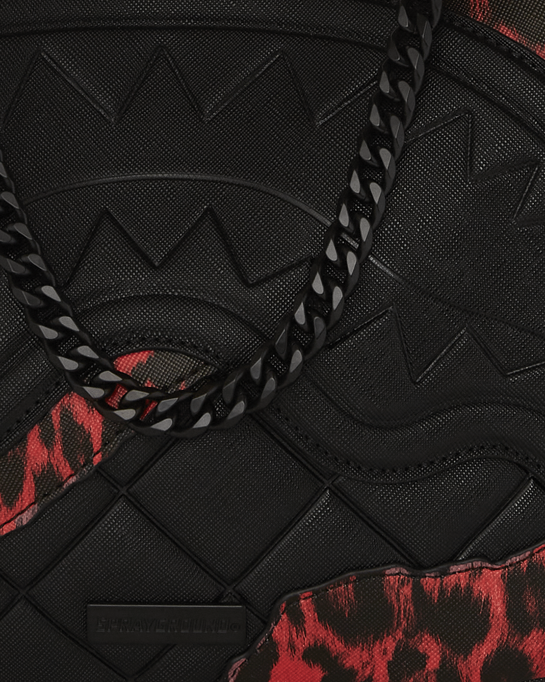 Interior shot of the leather bag displaying the organized pocket and SG handle detail