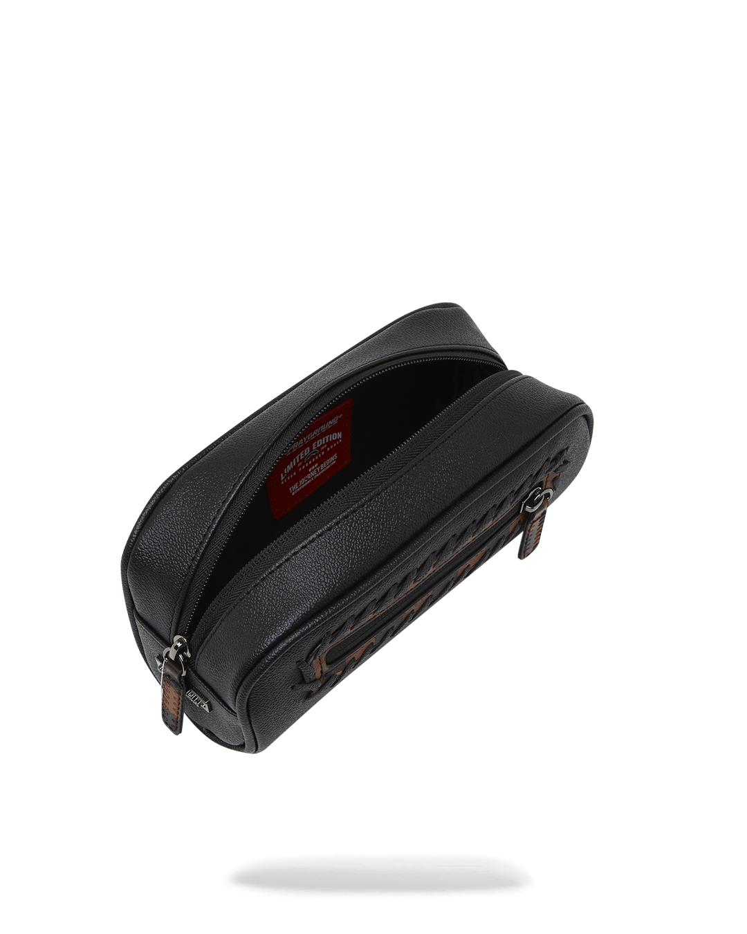 Front view of the Sprayground Checkpoint Royale pouch with embossed sharkmouth detail