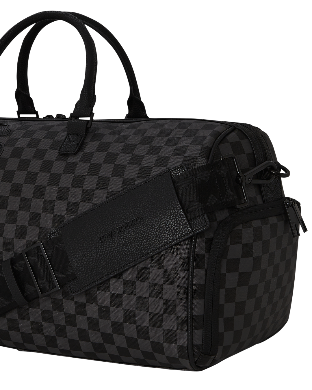 Adjustable strap detail on leather duffle bag for custom fit