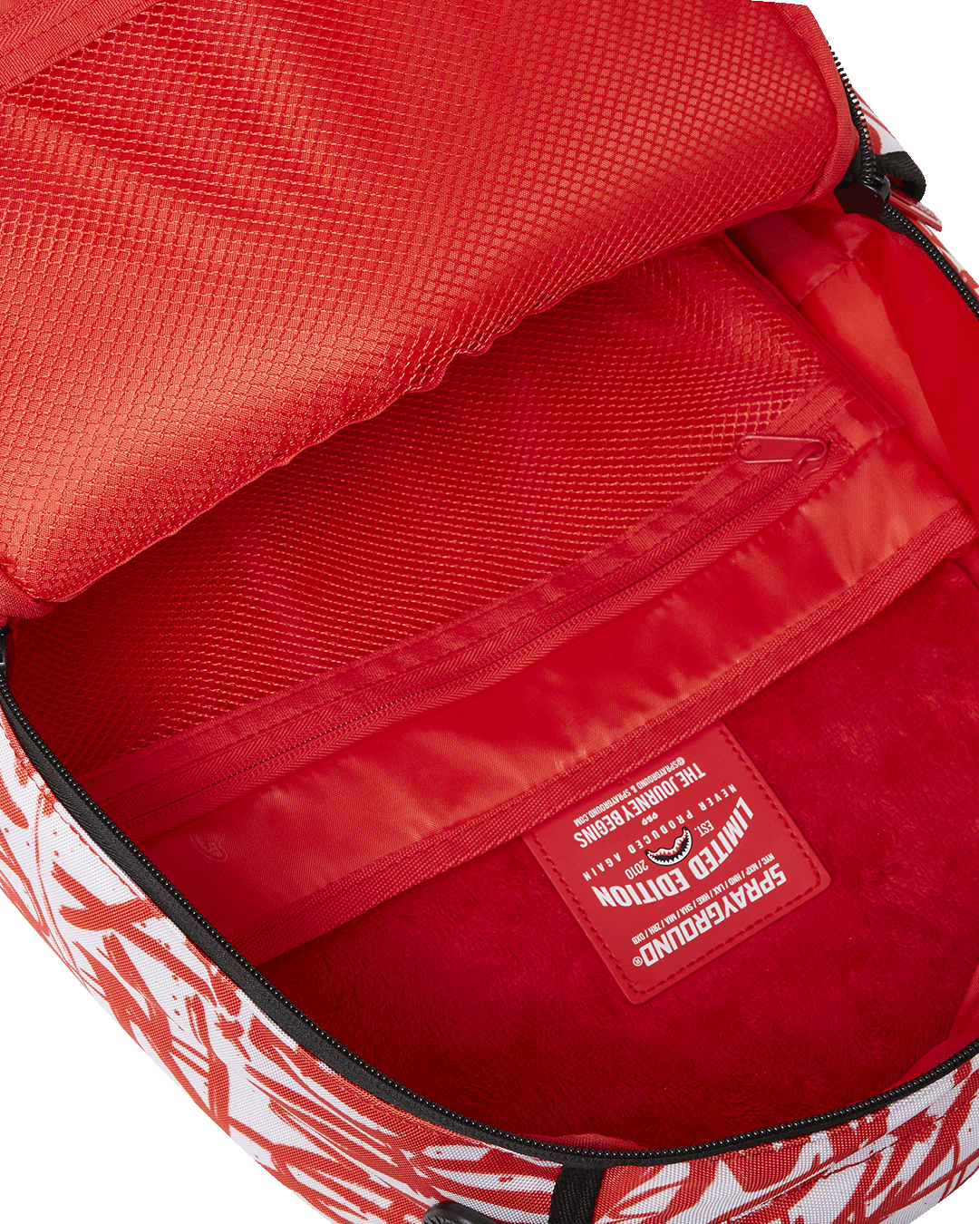 Backpacks interior showing velour laptop compartment and mesh organizer