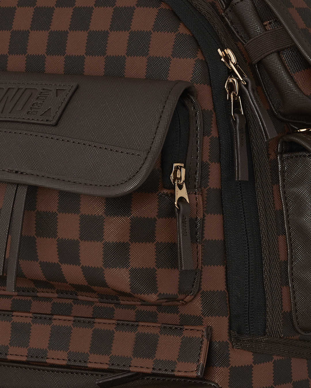 Close-up of the shark-back panel and custom buckles for added durability