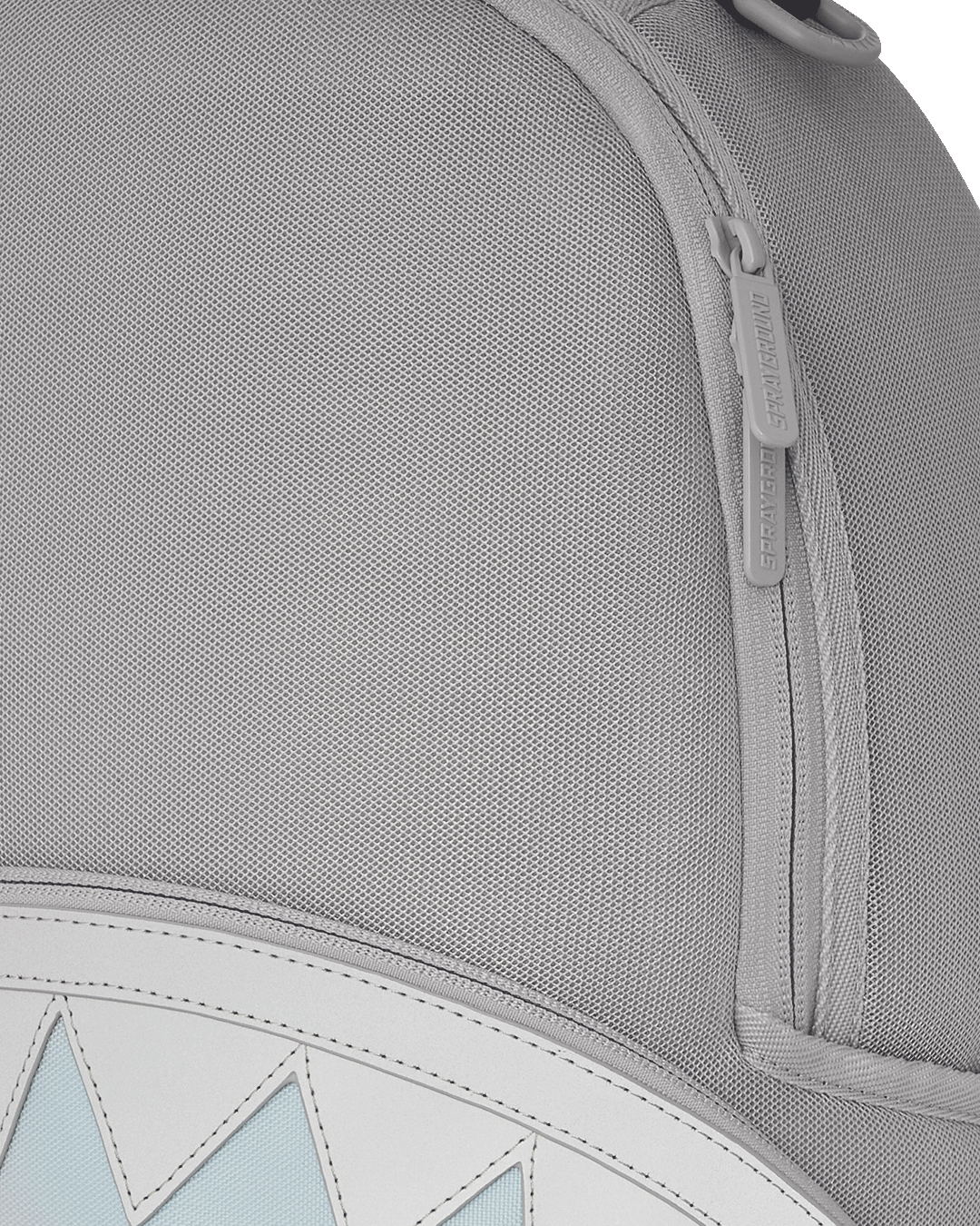 Front view of the stylish mesh backpack with reflective nylon accents and multiple compartments