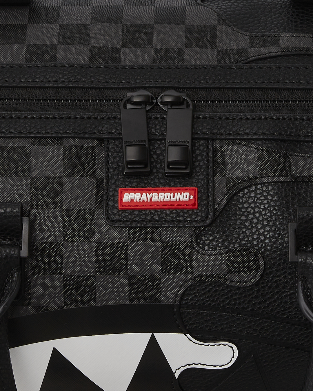 Open interior of mens duffle bag with sneaker compartment and gold zippers