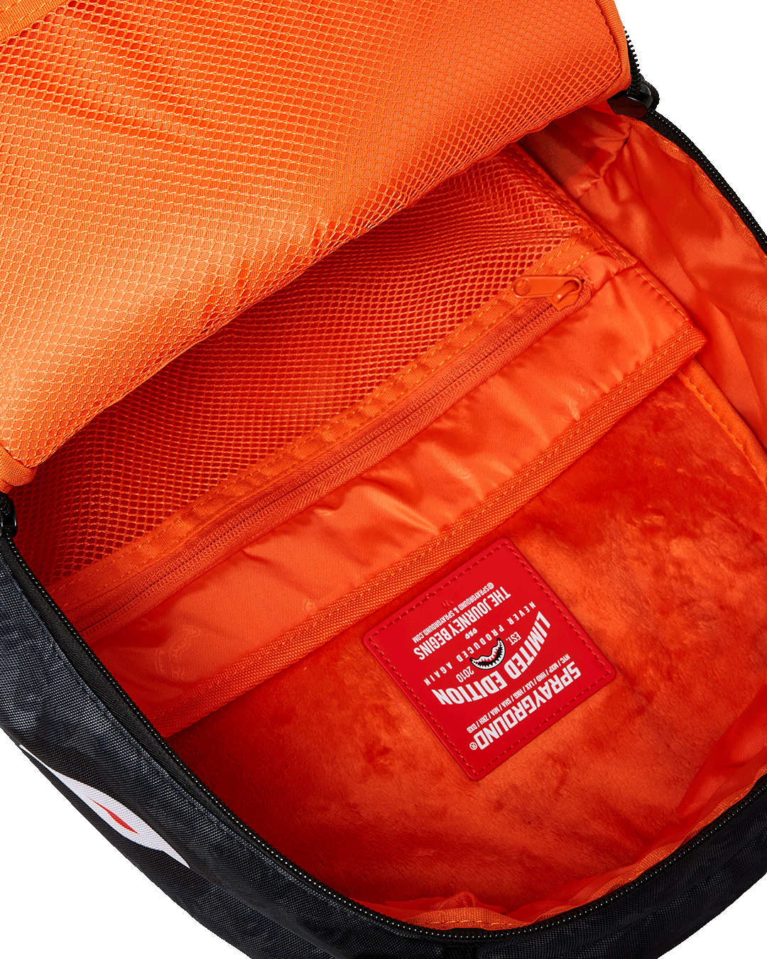 Side angle of the Touchdown backpack with adjustable straps and metal hardware.