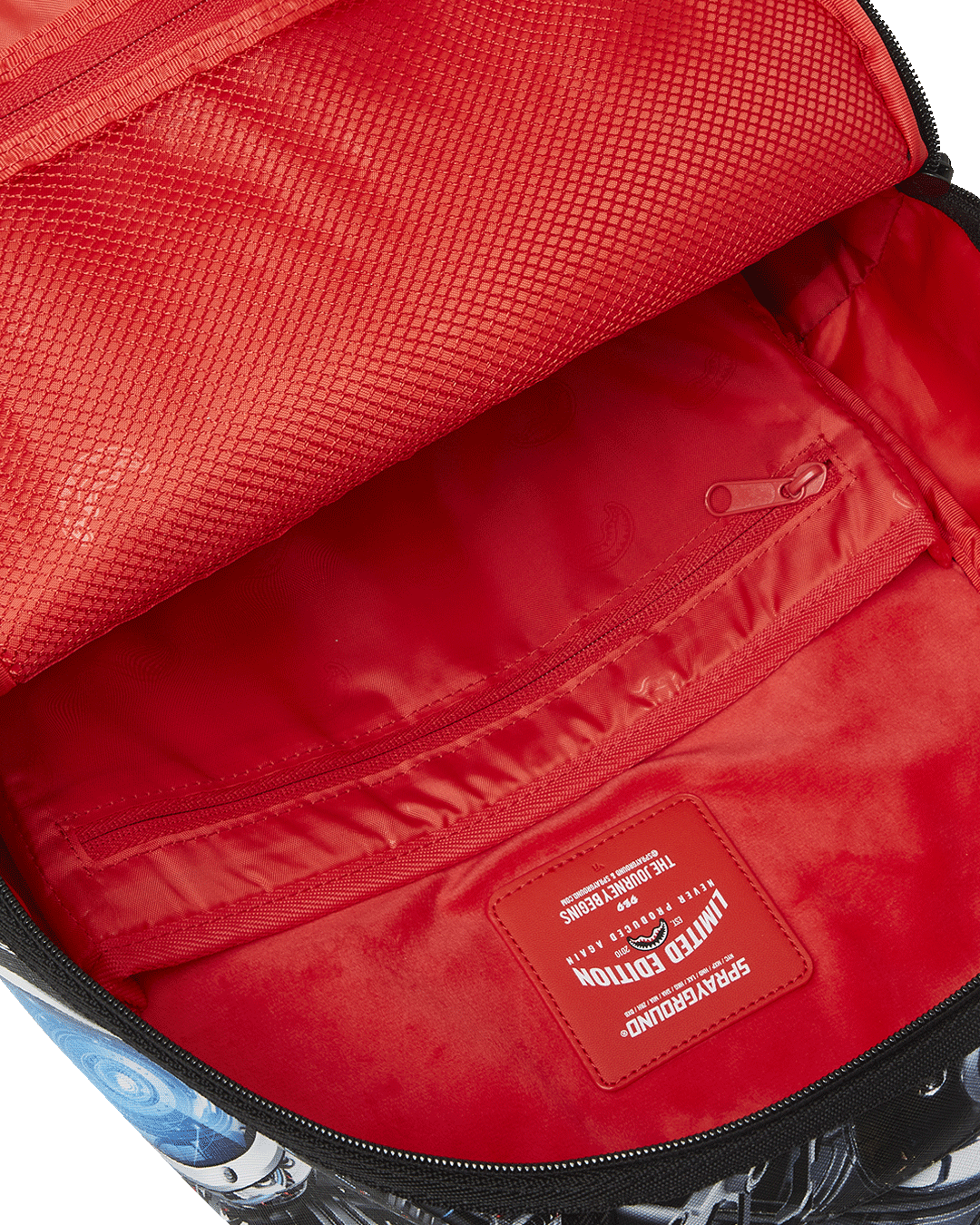 DLXR luxury travel backpack connected to carry-on luggage via slide-through back sleeve
