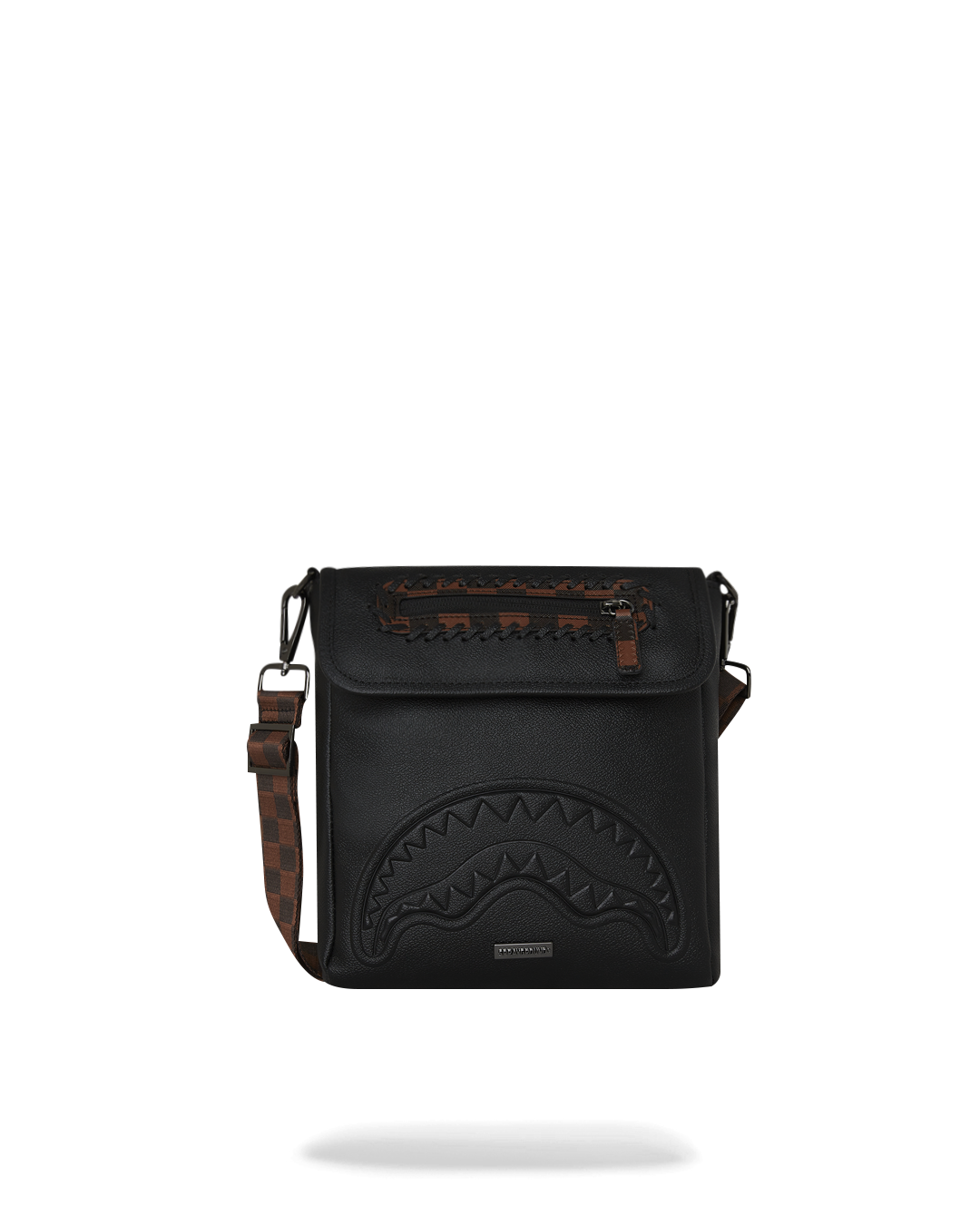 Checkpoint Royale sling bag showing embossed sharkmouth details and zipper pullers.