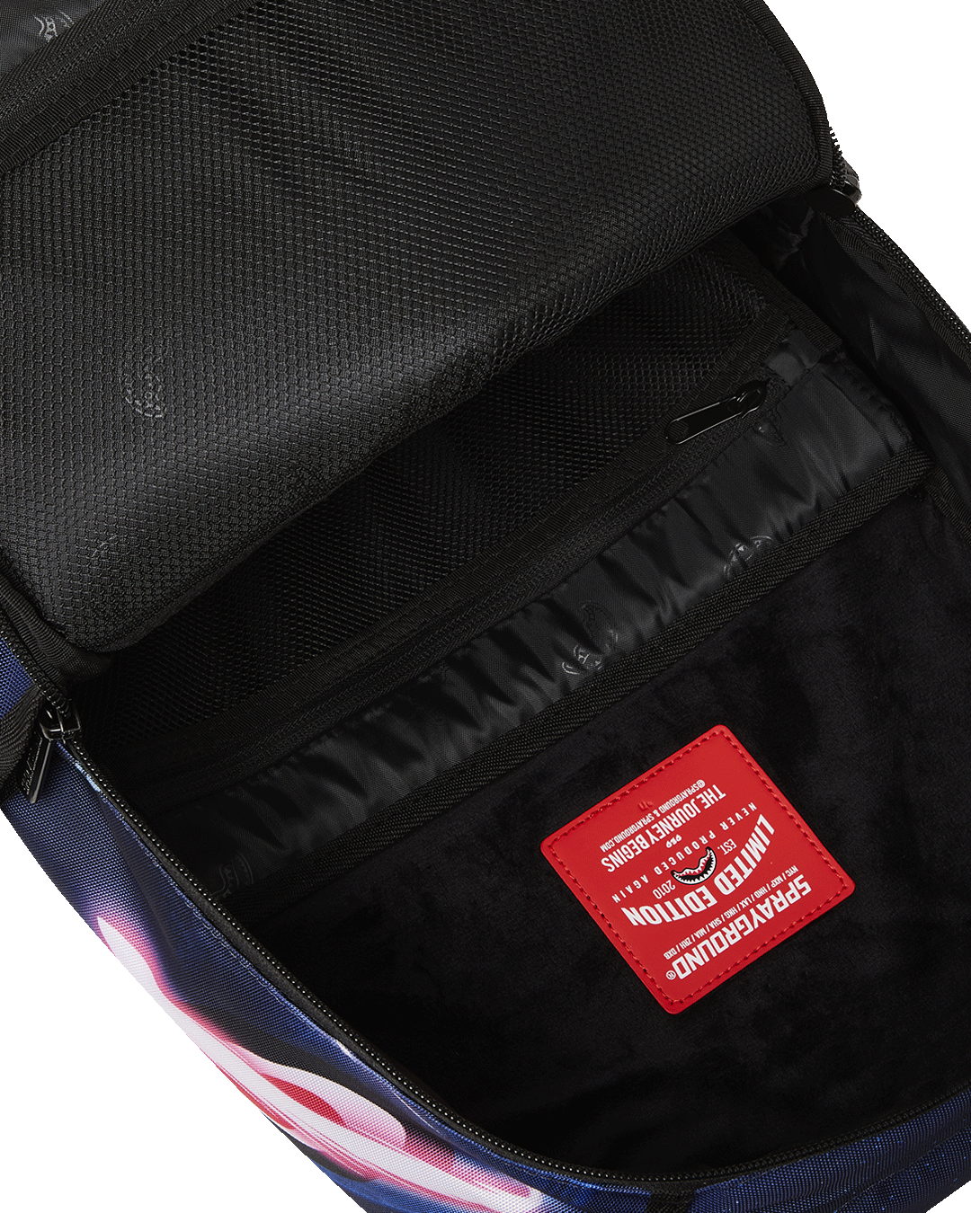 Side angle of the backpack highlighting adjustable straps and velour sunglass compartment.
