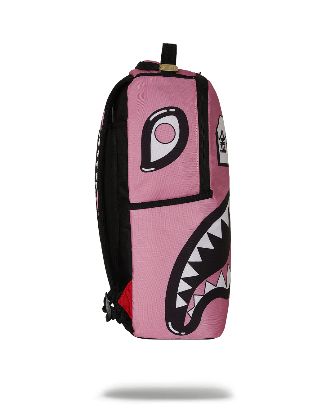 Front view of Sakura travel backpack showcasing gold zippers and side pockets