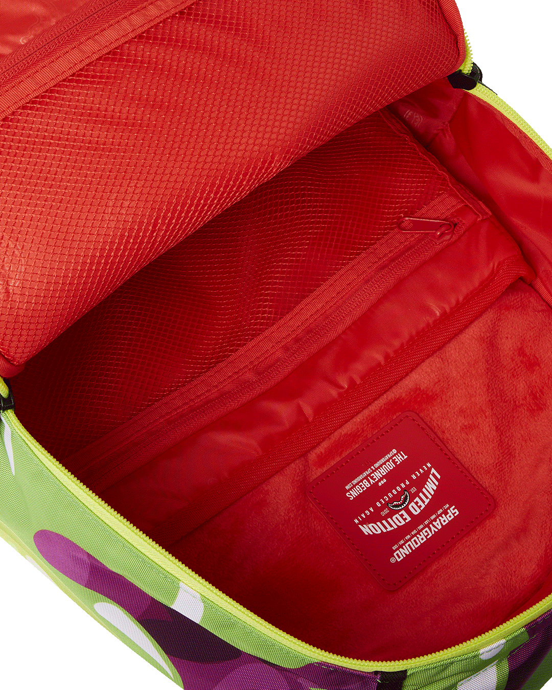 Front of the Gummy Spray DLXR backpack highlighting exterior pockets and stylish design
