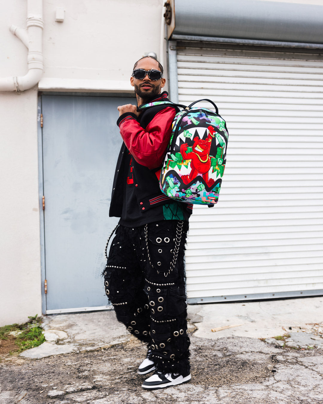 Sprayground Diablo luxury backpack worn by a traveler in an urban setting