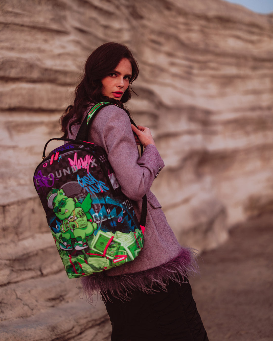 Front view of the ABEARRICAN Success DLXR travel backpack with gold zippers