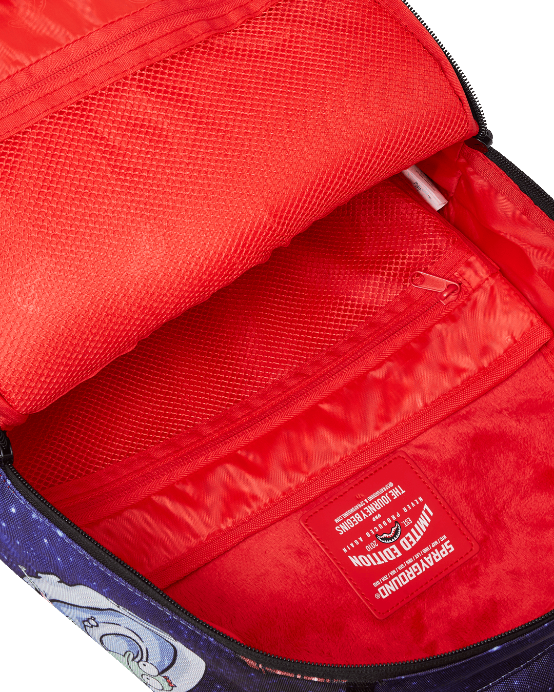 Backpack with insulation being worn on hiking trail with hydration tube visible