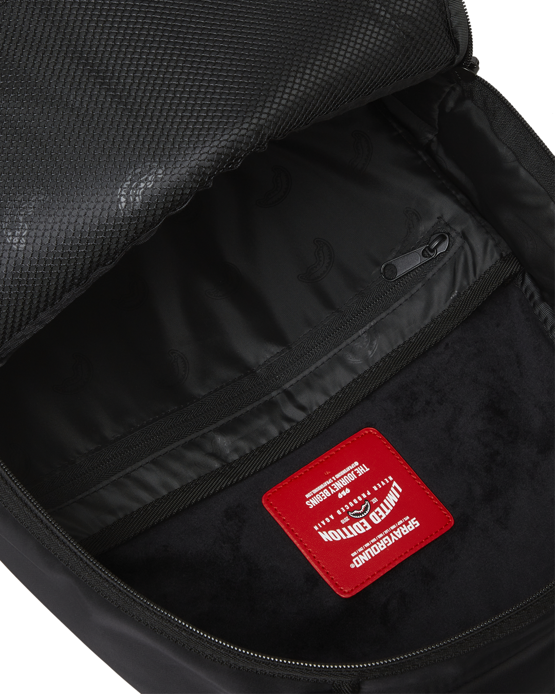 Close-up of the backpacks ergonomic mesh back padding and adjustable straps