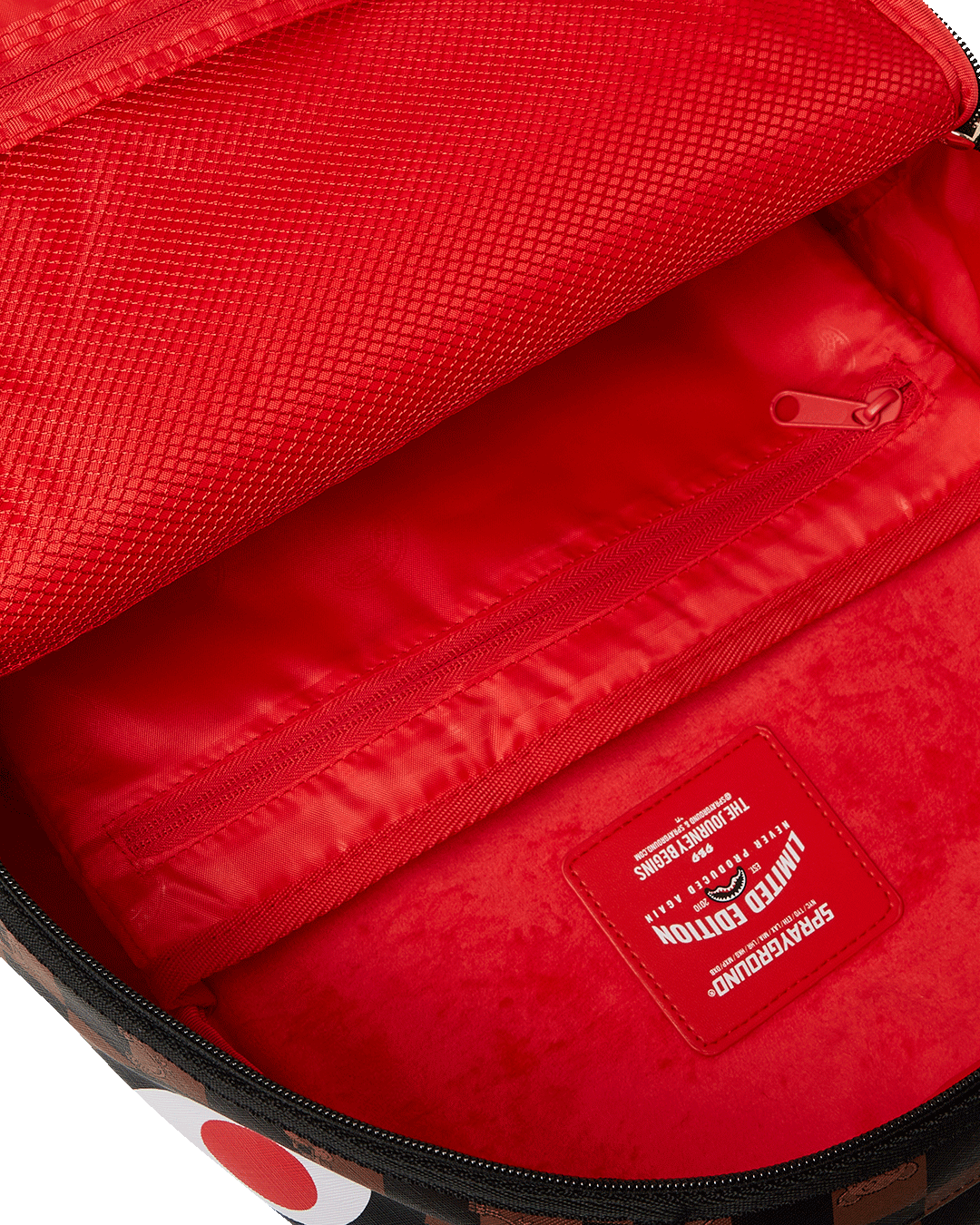 Side view highlighting water-resistant faux leather material and side pockets