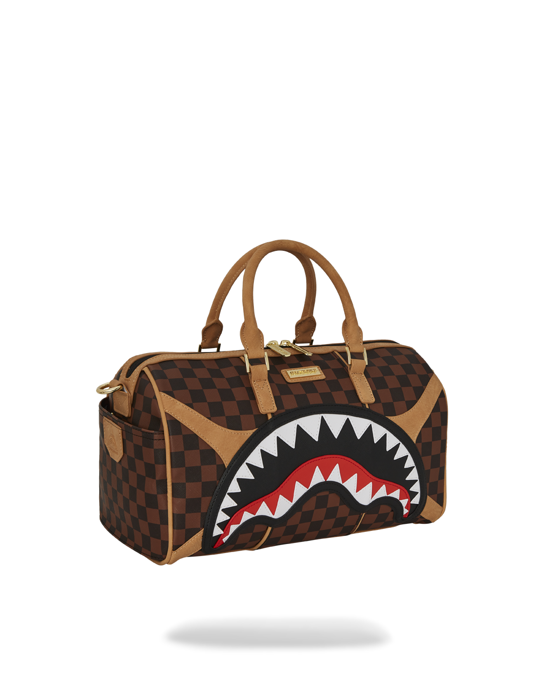 Side angle showing adjustable strap on faux leather bag resting on a table
