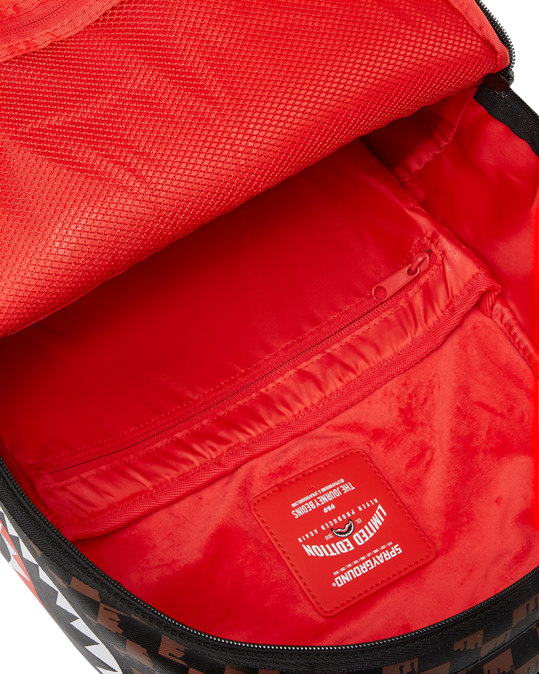 Interior of the faux leather backpack with laptop and organizer compartments