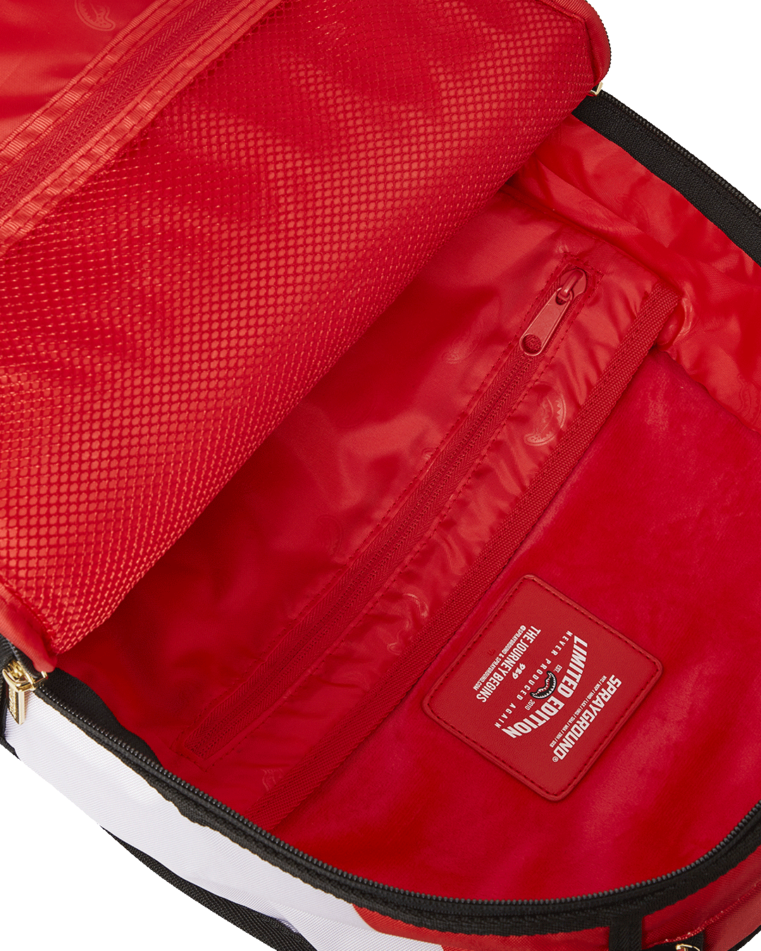 Back view of the clear Sprayground backpack with adjustable straps and gold hardware.