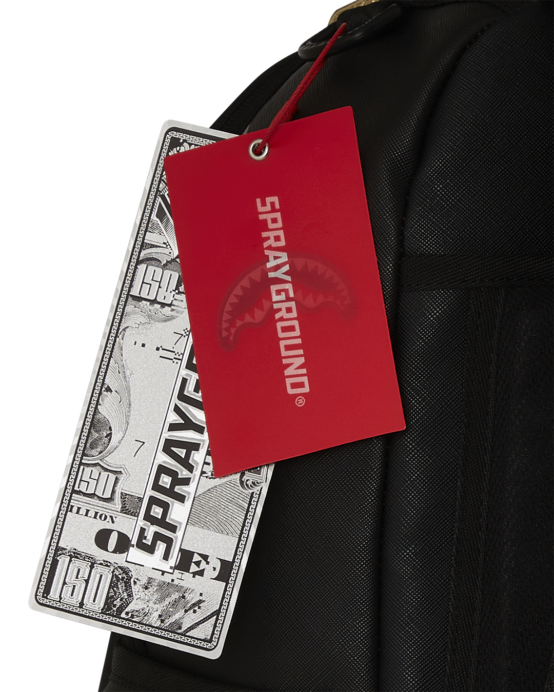 Close-up of Sprayground shark backpack’s Paris-inspired shark graphic.