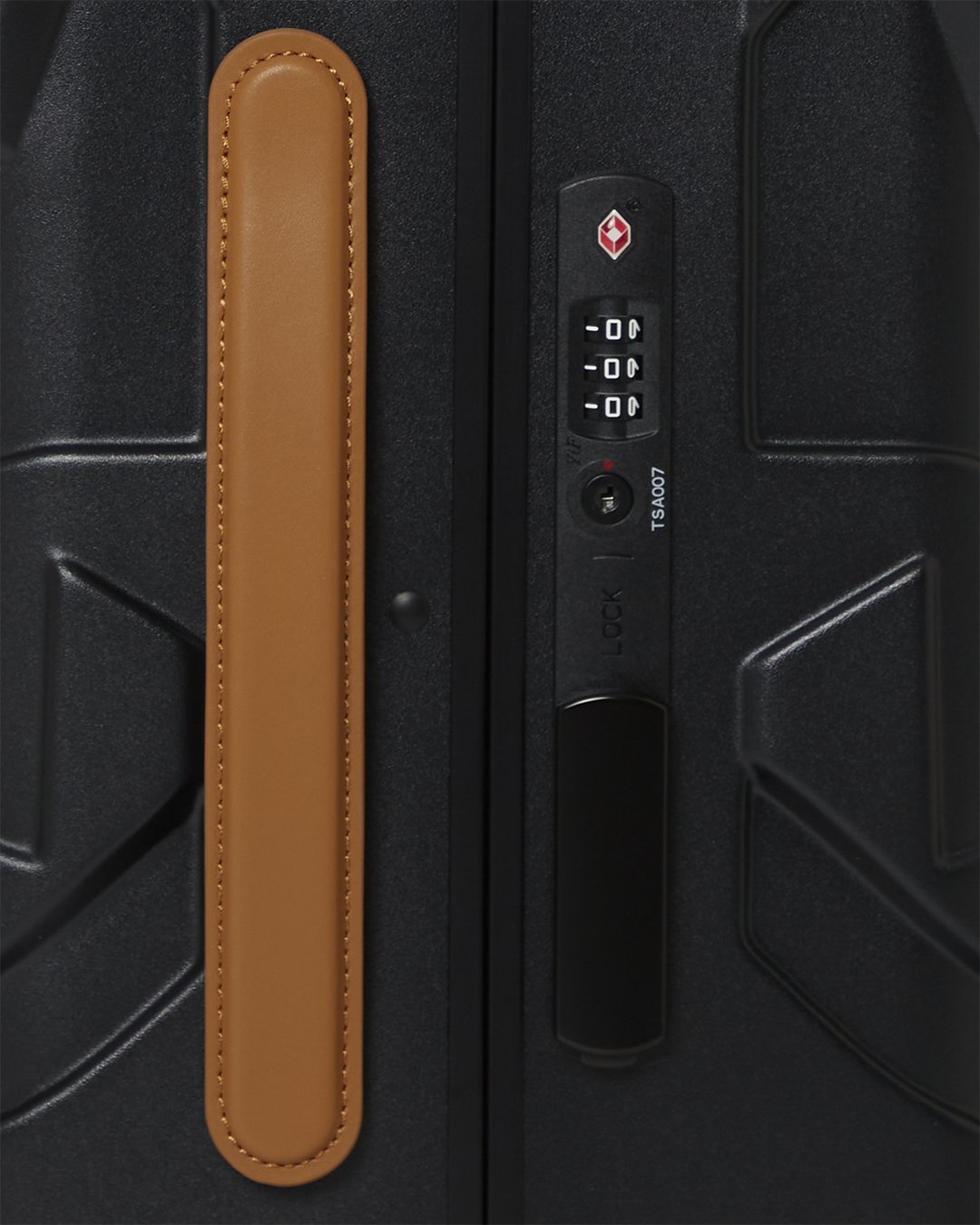 Close-up of double spinner wheels on the Sharkitecture Jetstream suitcase.