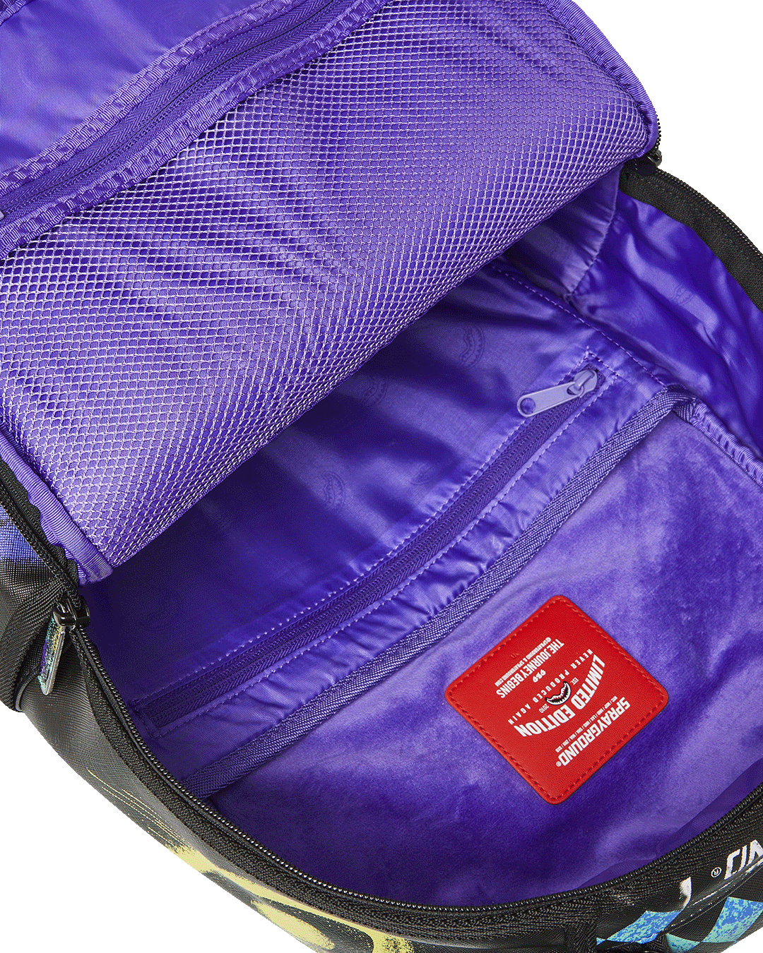 Side angle highlighting the water-resistant faux leather material and side pockets