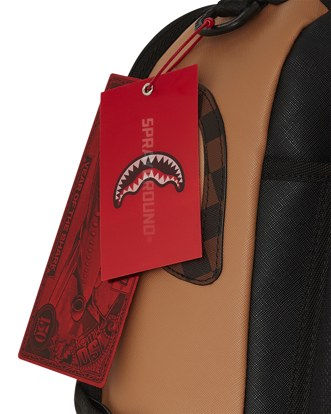 Hypeshark DLX faux leather backpack on a city park bench, showcasing side pockets and ergonomic straps