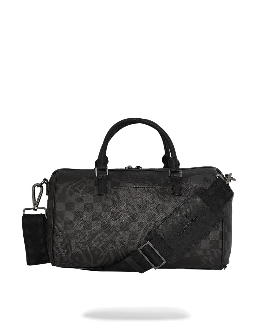 Front view of the faux leather mini duffle bag with strap adjusted for crossbody wear.