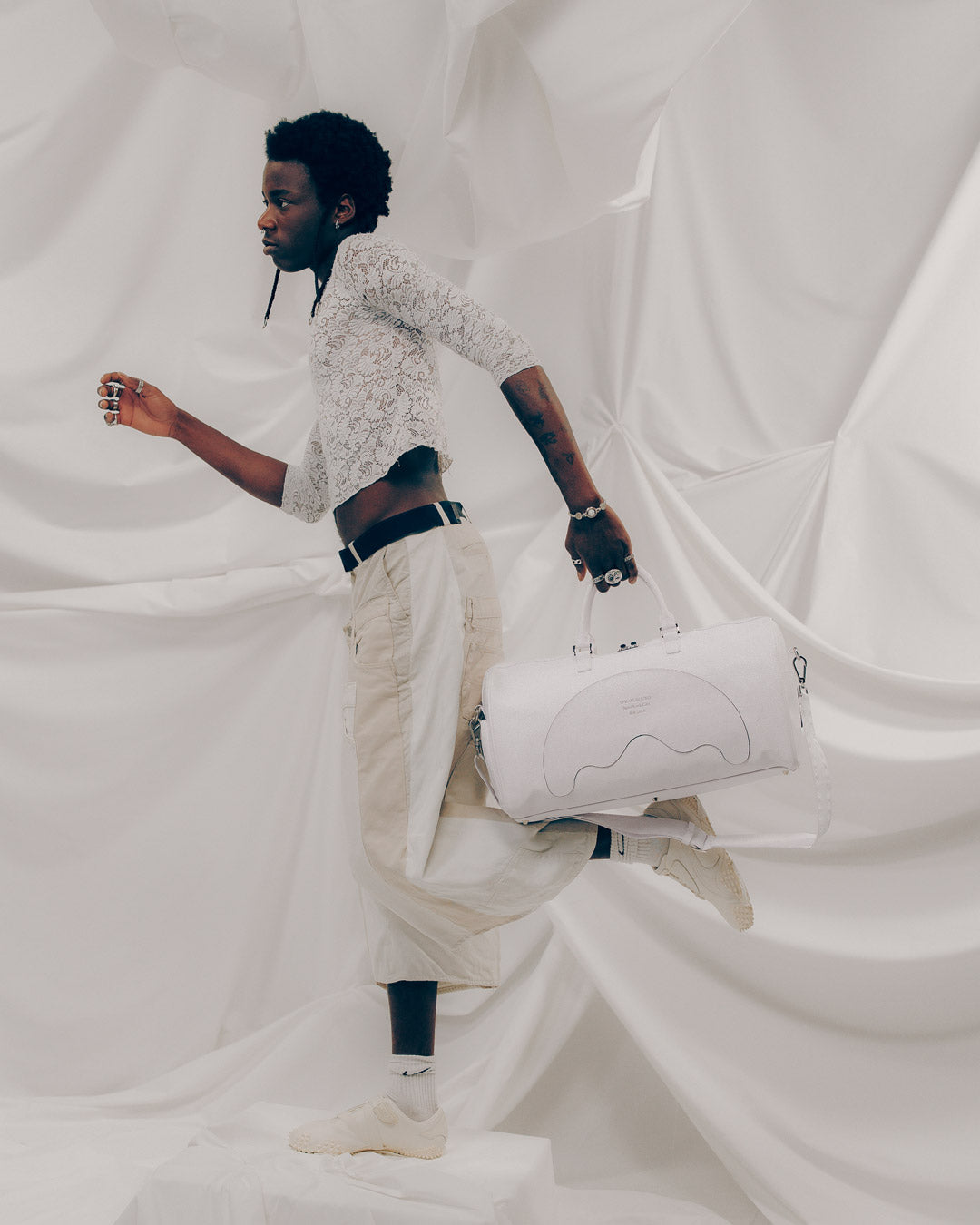 Inside view of the duffle bag featuring sneaker pocket.