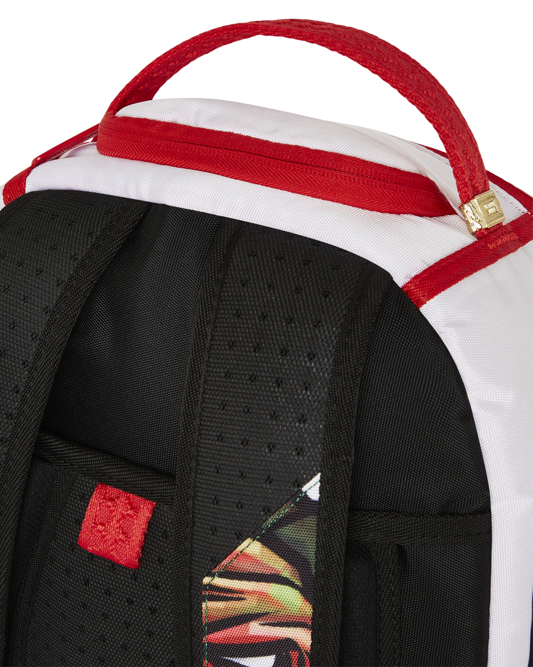 Side view of backpack showing mesh back padding and adjustable straps