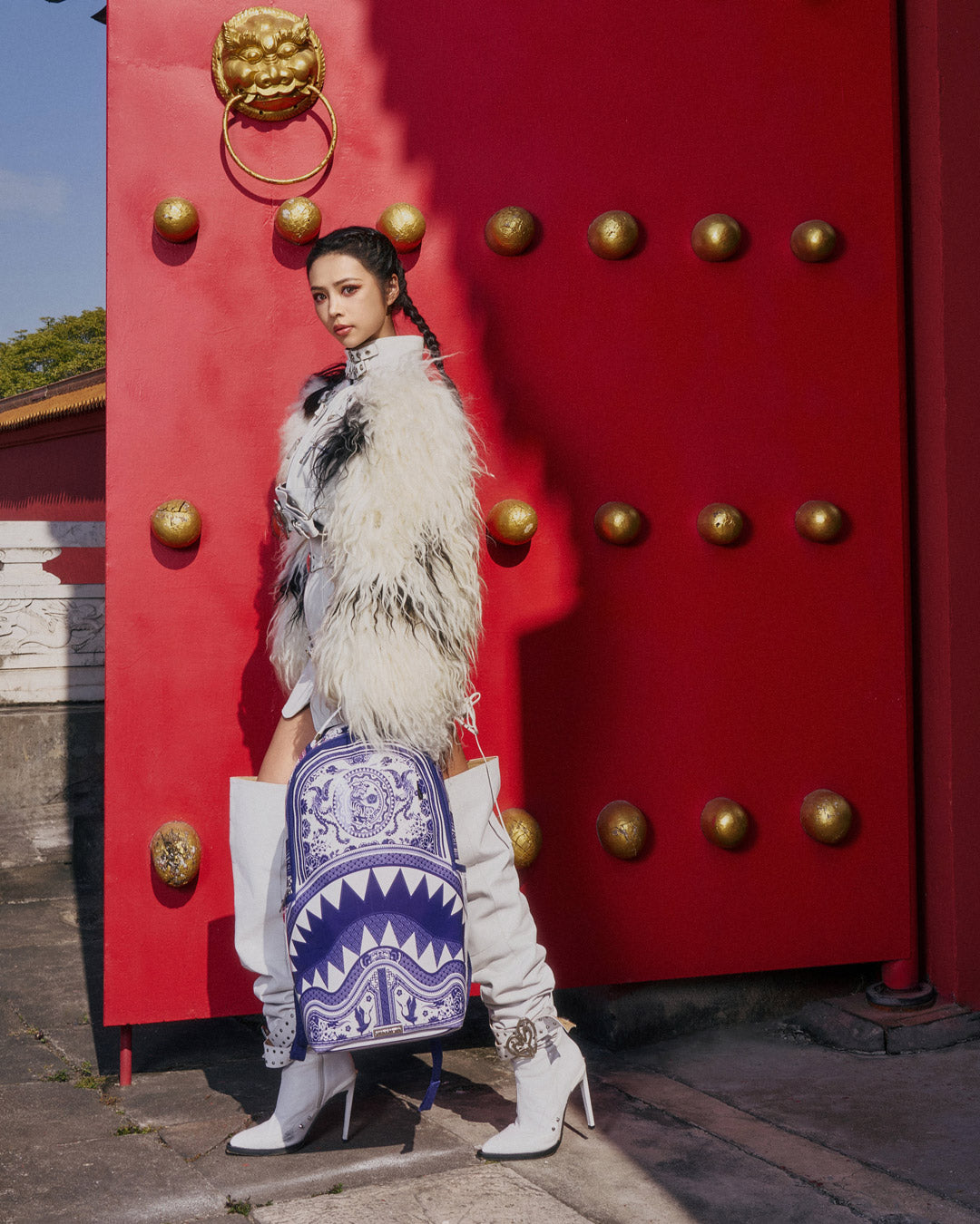 Front angle of the shark backpacks with patent leather shine