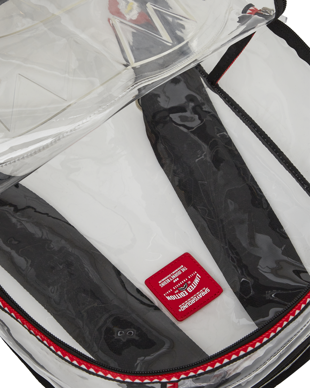 Side view of PVC backpack with adjustable straps and mesh padding