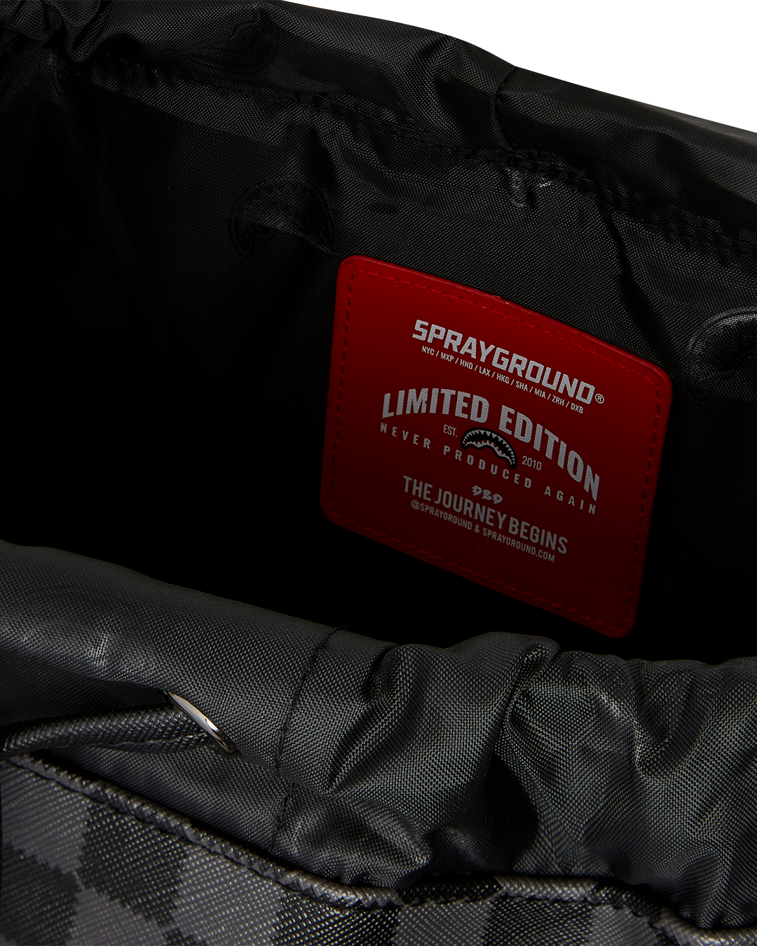 Interior view of the faux leather rucksack featuring laptop compartment.
