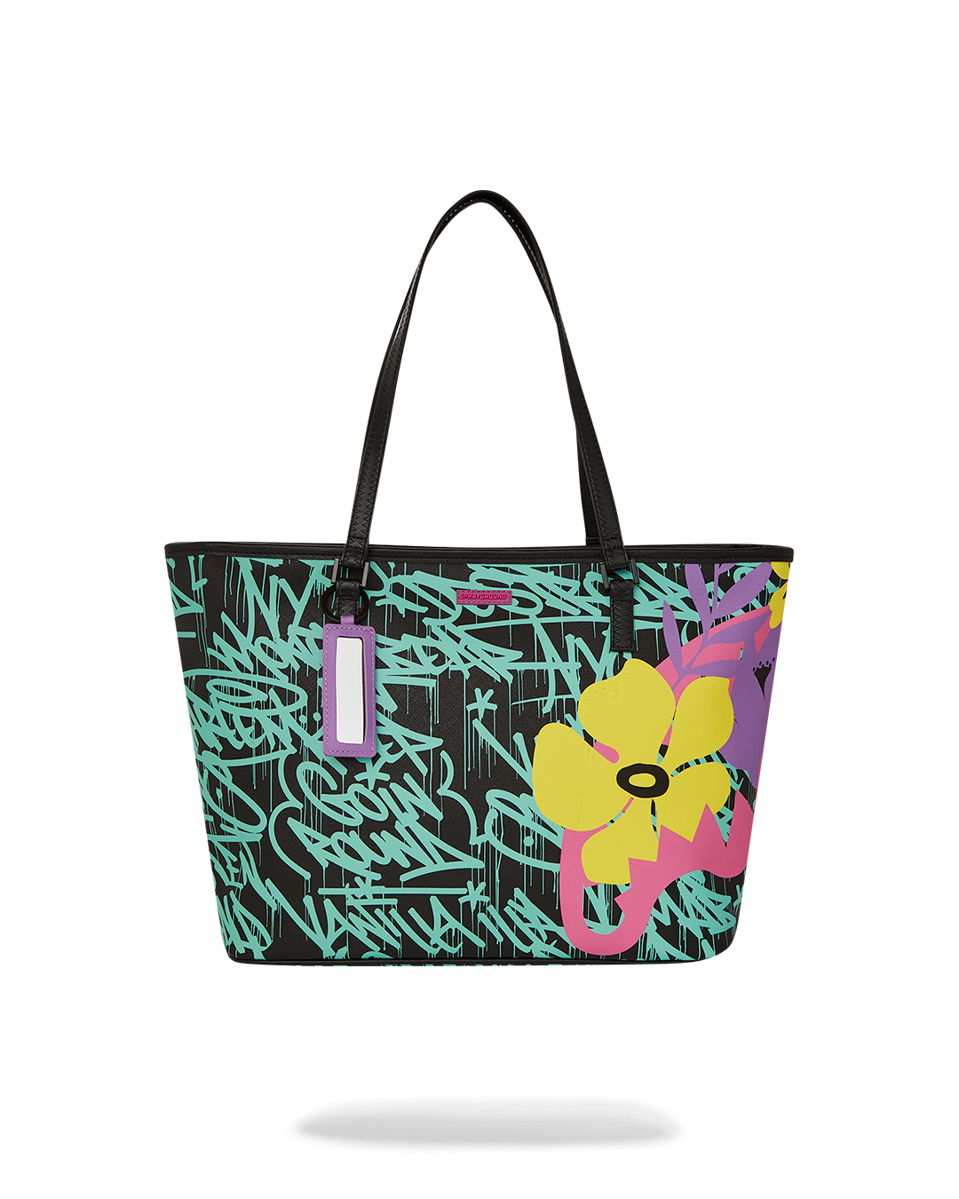 Sprayground Garden Glamour Tote held casually over the shoulder in a city setting
