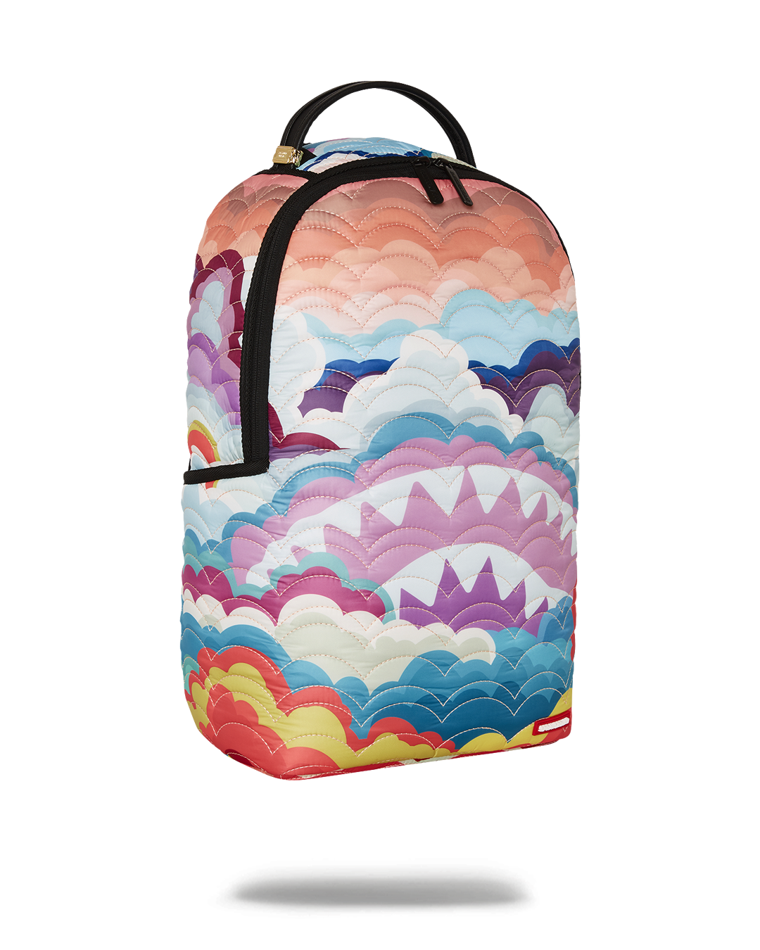 Open backpack revealing velour laptop compartment and interior organizer pockets