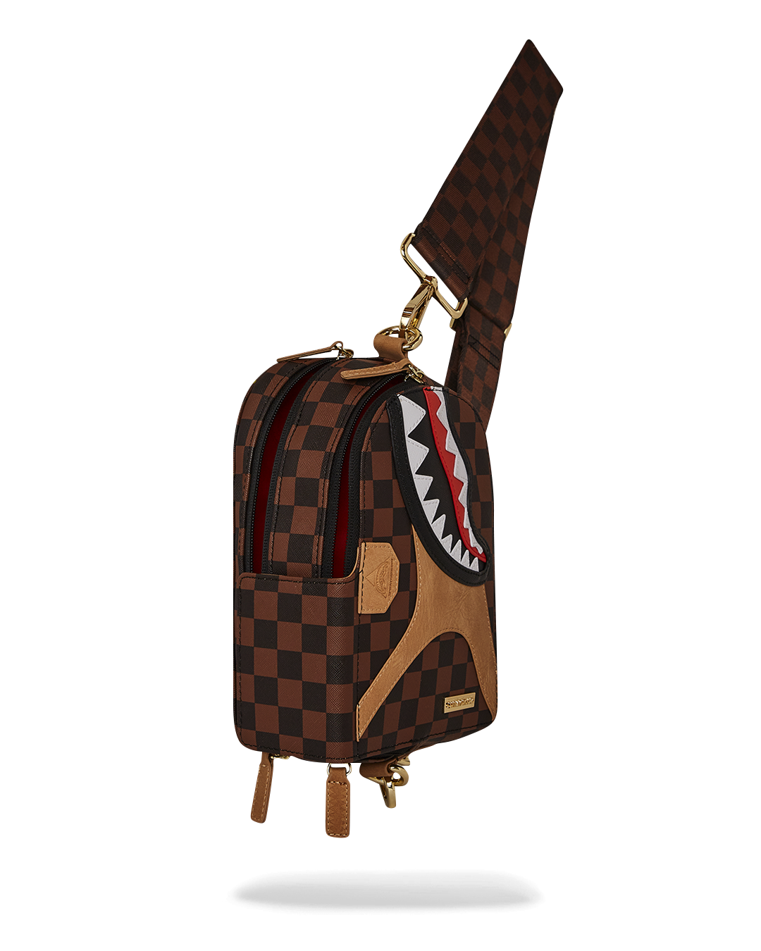 Adjustable strap detail showing Shark Mouth webbing on the backpack