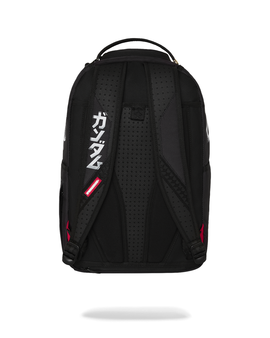 Front view of pink Sprayground backpack with Gundam artwork on urban street