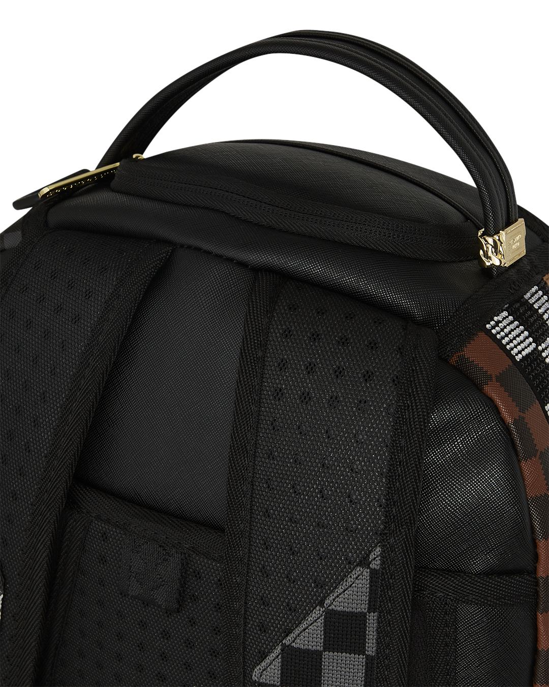 Front view of designer backpack showing textured exterior and golden zippers