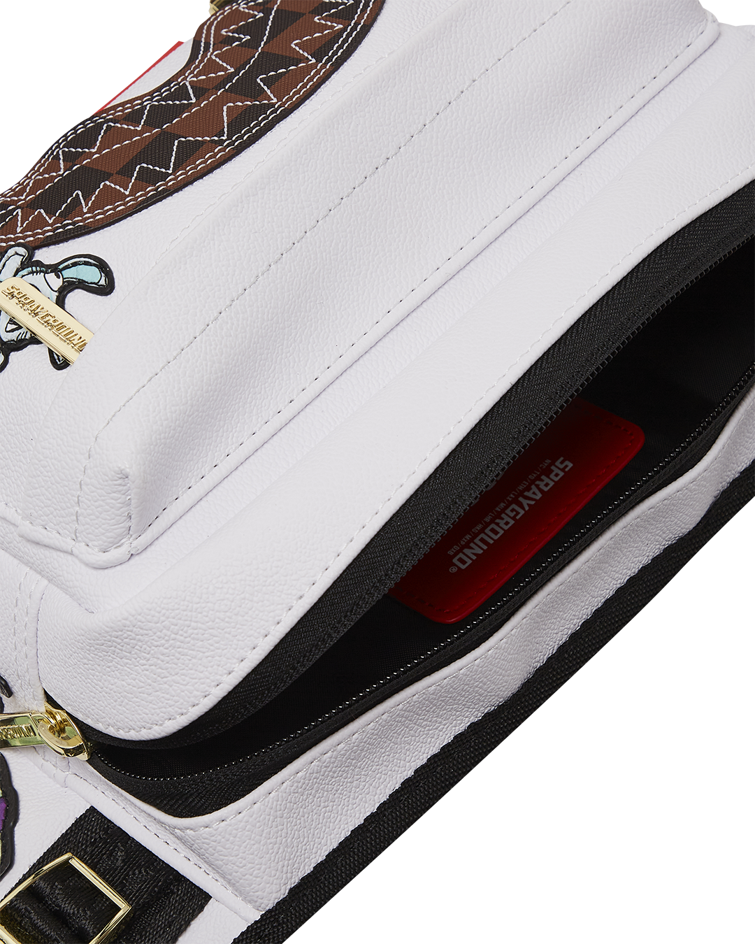 Close-up of the stylish cargo crossbody bag with embroidered sharkmouth detail and adjustable strap