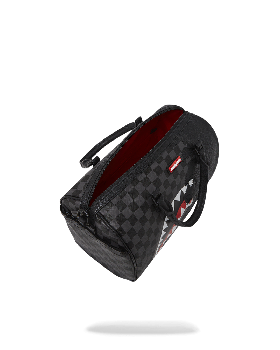 Front view of the Speed Shark mini duffle bag showcasing its faux leather texture.